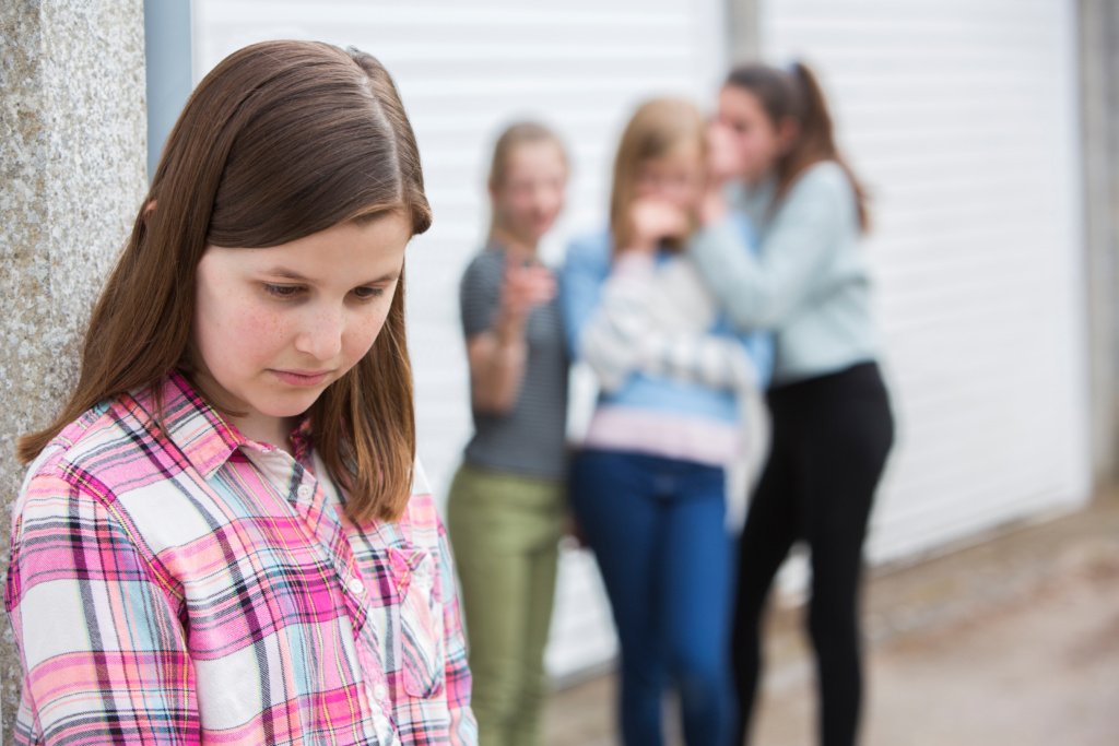 Sad Pre Teen Girl Feeling Left Out By Friends