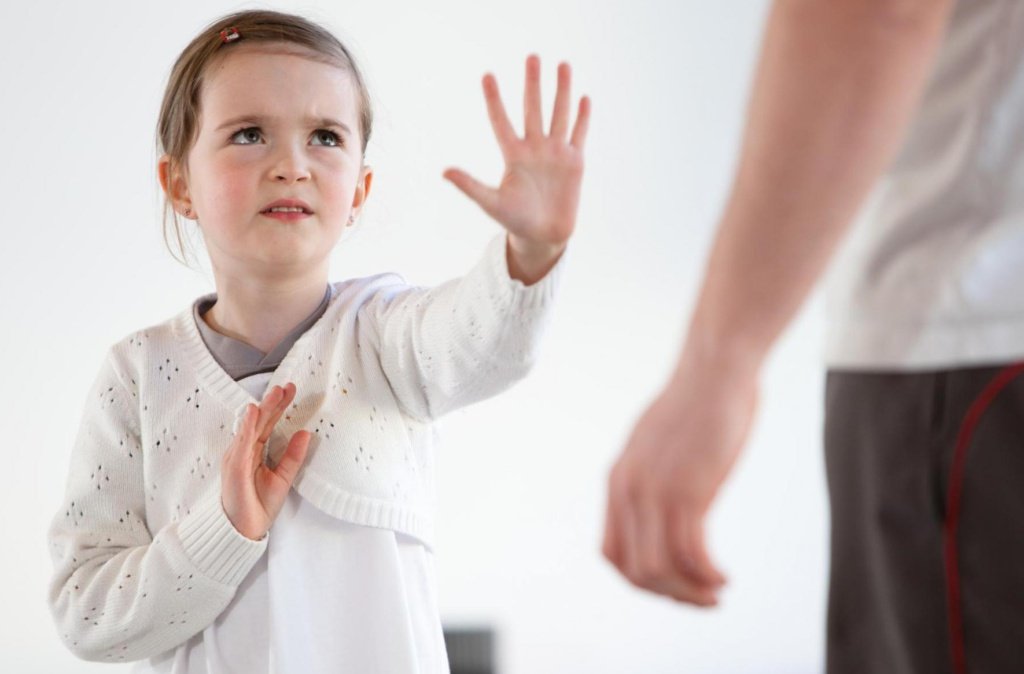 Girl exercising in group during dance class