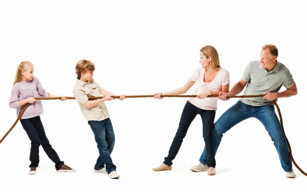 Family Playing a Game of Tug O War - Isolated